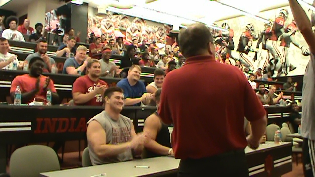 hypnotist Chris Cady demonstration hypnosis with a football mental game toughness